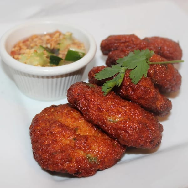 Green Basil Thai Restaurant's fried fish cakes with a side of cucumber salad.